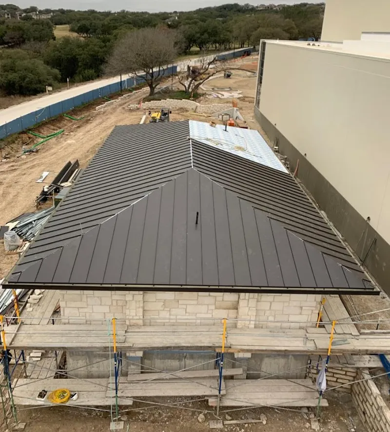 Metal roof new construction with scaffolding in Wilmington
